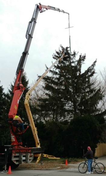 Crane raising cross